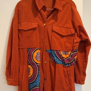 Vibrant Orange Corduroy Utility Shacket with Patterned Accents